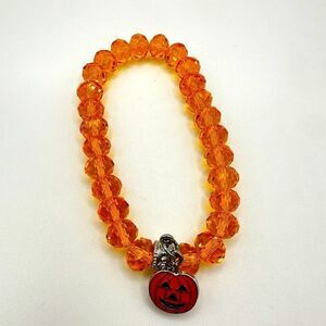 SALE! Faceted orange crystal glass beaded bracelet with jack-o-lantern charm!